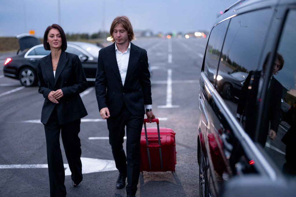 business couple walking with a suitcase on parking 2025 03 13 23 03 13 utc
